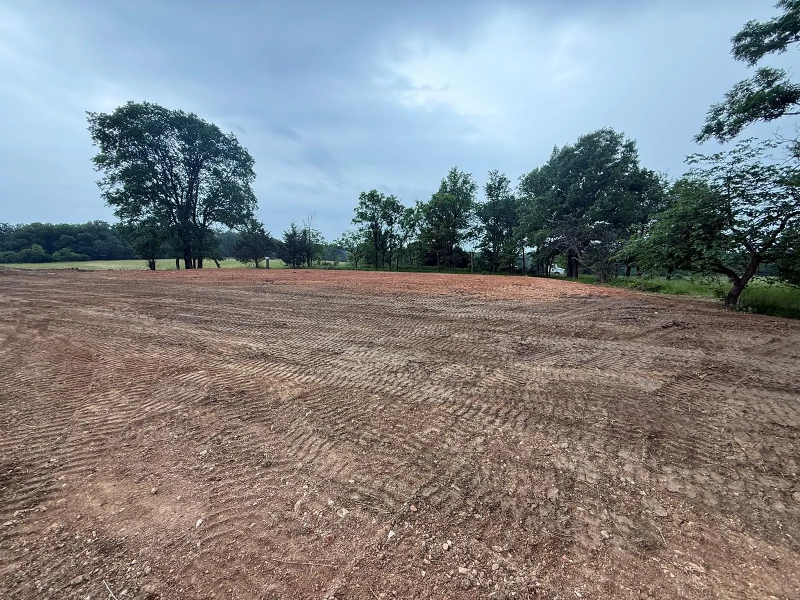 Cleared and graded building pad ready for construction